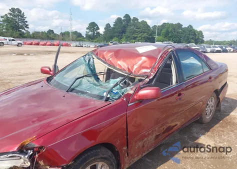 2004 Toyota Camry Le V6 z USA, uszkodzony, nr VIN 4T1BF32KX4U073166